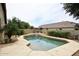 Inviting pool with tanning deck, lounge chairs, and a tranquil backyard setting at 8341 W Gross Ave, Tolleson, AZ 85353