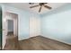 Cozy bedroom with closet, blue walls, and adjacent room entrance offering a warm ambiance at 860 N Mcqueen Rd # 1157, Chandler, AZ 85225