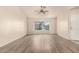 Sunny living room features new flooring and a large window for lots of light at 860 N Mcqueen Rd # 1157, Chandler, AZ 85225
