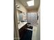 Cozy bathroom featuring a vanity with sink, a toilet, and a shower with a Paris-themed curtain at 9060 N 47Th Ln, Glendale, AZ 85302