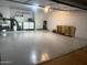 Spacious garage featuring sealed concrete floors, laundry area, and ample storage space at 9060 N 47Th Ln, Glendale, AZ 85302