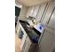 Kitchen featuring sleek countertops, offering ample space for food prep and storage at 9060 N 47Th Ln, Glendale, AZ 85302