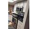 Modern kitchen featuring stainless steel appliances and stylish countertops for cooking and entertaining at 9060 N 47Th Ln, Glendale, AZ 85302