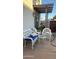 Outdoor patio with comfortable wicker furniture, plants, and a shaded pergola at 9060 N 47Th Ln, Glendale, AZ 85302