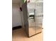 Spacious refrigerator with water dispenser providing convenience in the kitchen at 9060 N 47Th Ln, Glendale, AZ 85302