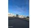 A building's flat roof with fencing provides an outdoor space with great sky views at 9060 N 47Th Ln, Glendale, AZ 85302