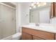 Bathroom with a shower and modern vanity at 9863 W Country Club Ct, Sun City, AZ 85373