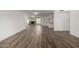 Expansive living space with tile floors, neutral walls, and an open layout perfect for entertaining at 9863 W Country Club Ct, Sun City, AZ 85373