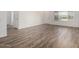 Bright living space with neutral colors, tiled floors, and an open layout at 9863 W Country Club Ct, Sun City, AZ 85373