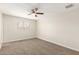 Cozy bedroom with neutral walls, carpet, and ceiling fan for comfortable living at 9920 N 73Rd Ave, Peoria, AZ 85345
