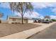 Charming single-story home in a residential neighborhood, showcasing a low maintenance yard at 9920 N 73Rd Ave, Peoria, AZ 85345