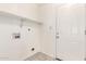 Functional laundry room featuring laundry hookups and access to the backyard at 9920 N 73Rd Ave, Peoria, AZ 85345