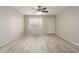 Bright living room with a ceiling fan and tiled floors for added comfort at 9920 N 73Rd Ave, Peoria, AZ 85345