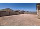 This home features a large dirt backyard with a block wall. Ready for landscaping at 10837 W Bloch Rd, Tolleson, AZ 85353