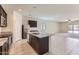 Stylish kitchen with granite countertops, stainless steel appliances, and an open layout at 10837 W Bloch Rd, Tolleson, AZ 85353
