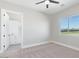Bedroom with ensuite bathroom and a view of the backyard at 1228 N 106Th Pl, Mesa, AZ 85207