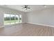 Bright living room with sliding glass doors to a backyard at 1228 N 106Th Pl, Mesa, AZ 85207