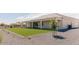 Expansive backyard with artificial grass and tasteful gravel landscaping at 1229 N 106Th Pl, Mesa, AZ 85207