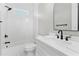 Clean bathroom design featuring white subway tile, modern fixtures, and a sleek vanity at 1229 N 106Th Pl, Mesa, AZ 85207