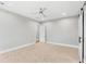 Large bedroom featuring carpet flooring, and an adjoining door to another room at 1229 N 106Th Pl, Mesa, AZ 85207