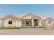 Charming single-story home with stone accents and well-manicured lawn at 1229 N 106Th Pl, Mesa, AZ 85207