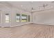 Bright and airy living room with recessed lighting, a ceiling fan, and an adjacent doorway at 1229 N 106Th Pl, Mesa, AZ 85207