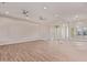 Expansive living room with an open floor plan and light hardwood floors at 1229 N 106Th Pl, Mesa, AZ 85207