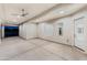 Spacious covered patio with fan, perfect for outdoor entertaining and relaxation at 1229 N 106Th Pl, Mesa, AZ 85207