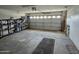 Two car garage featuring a concrete floor and lots of room for storage at 1264 W 6Th Ave, Apache Junction, AZ 85120