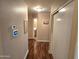 Hallway with wood flooring leading to other areas of the home at 1264 W 6Th Ave, Apache Junction, AZ 85120