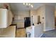 Bright kitchen featuring modern appliances, ample cabinetry, and breakfast bar at 1264 W 6Th Ave, Apache Junction, AZ 85120