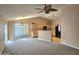Open concept living room seamlessly connected to the kitchen, perfect for modern living at 1264 W 6Th Ave, Apache Junction, AZ 85120