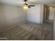 Spacious bedroom with neutral walls, new carpet, and a ceiling fan at 1320 E Bellerive Dr, Chandler, AZ 85249
