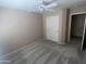 Neutral bedroom features carpet flooring, ceiling fan, and closet at 1320 E Bellerive Dr, Chandler, AZ 85249