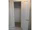 Open closet features multiple hanging rods behind an open white door at 1320 E Bellerive Dr, Chandler, AZ 85249