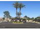 Community entrance with palm trees and gatehouse at 1320 E Bellerive Dr, Chandler, AZ 85249