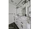 Bathroom featuring double vessel sinks and a black and white marble countertop at 1401 S Rita Ln, Tempe, AZ 85281