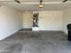 A spacious two car garage with a water heater and additional storage space at 14228 N 150Th Ln, Surprise, AZ 85379
