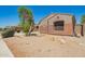 Charming single-story home with desert landscaping and neutral-toned stucco exterior at 18322 W Sweet Acacia Dr, Goodyear, AZ 85338