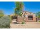 Charming single-story home with desert landscaping and neutral-toned stucco exterior at 18322 W Sweet Acacia Dr, Goodyear, AZ 85338
