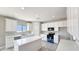 A kitchen with an island, lots of cabinet space and stainless steal appliances at 20411 W Mountain Sage W Dr, Buckeye, AZ 85326