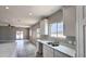 Well-lit kitchen with quartz countertops and windows at 20411 W Mountain Sage W Dr, Buckeye, AZ 85326