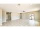 Expansive living room with tile flooring and natural light at 20411 W Mountain Sage W Dr, Buckeye, AZ 85326