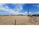 View of vacant land surrounding single-Gathering homes in a rural setting at 20411 W Mountain Sage W Dr, Buckeye, AZ 85326