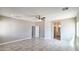 Spacious bedroom with tile floors, neutral paint, and recessed lighting creates a calming atmosphere at 20419 W Mountain Sage Dr, Buckeye, AZ 85326