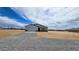 Single-story home featuring desert landscaping and a spacious gravel driveway at 20419 W Mountain Sage Dr, Buckeye, AZ 85326
