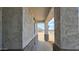 Inviting view through the covered front porch to the surrounding desert landscape at 20419 W Mountain Sage Dr, Buckeye, AZ 85326