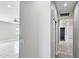 Bright hallway with recessed lighting and tile floors that creates a clean and welcoming entrance at 20419 W Mountain Sage Dr, Buckeye, AZ 85326