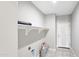 Laundry room featuring overhead shelving at 20419 W Mountain Sage Dr, Buckeye, AZ 85326