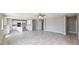 Open-concept living space seamlessly connecting the kitchen and living room with ample space at 20419 W Mountain Sage Dr, Buckeye, AZ 85326
